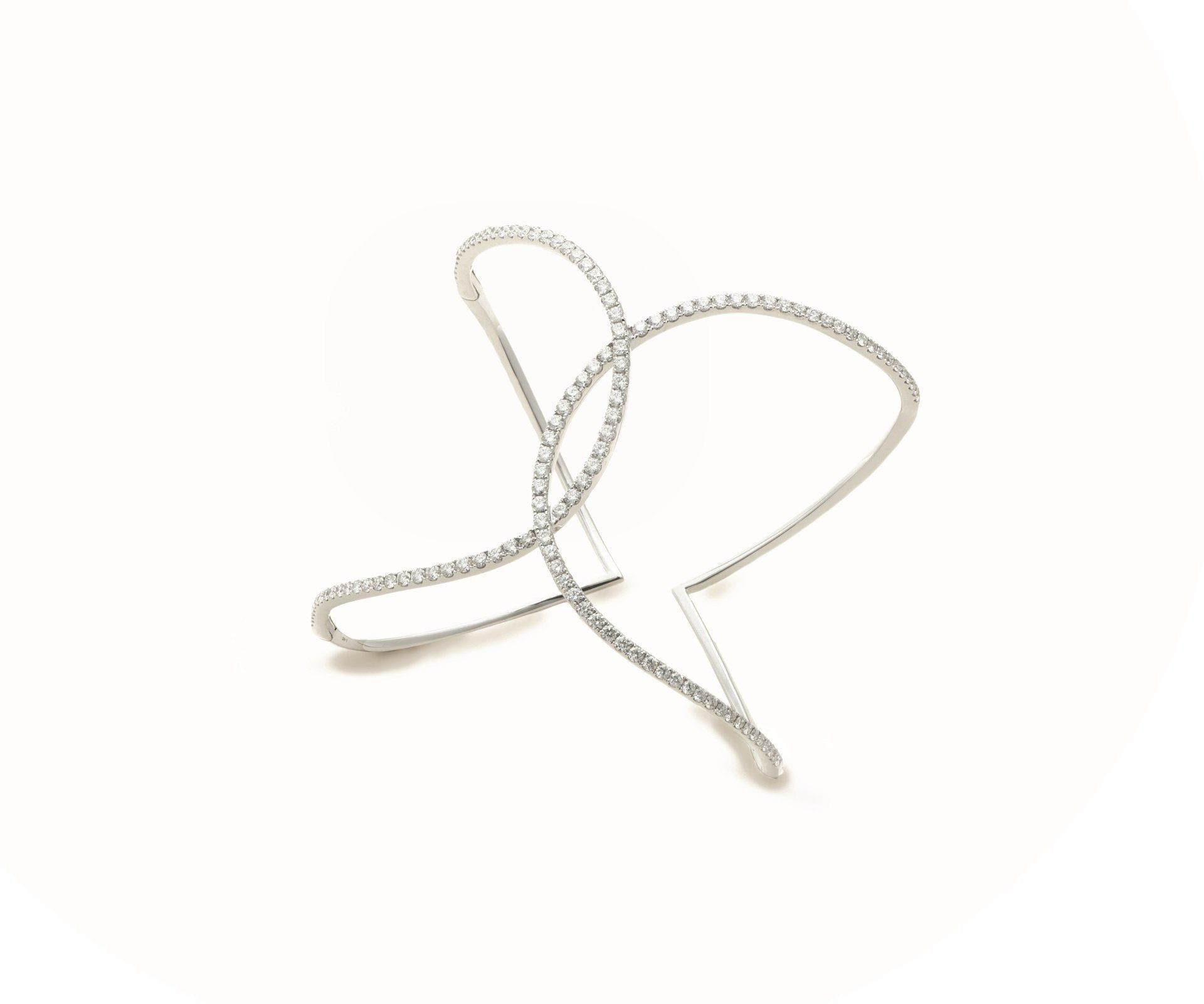 A fine crossover bangle set with diamonds