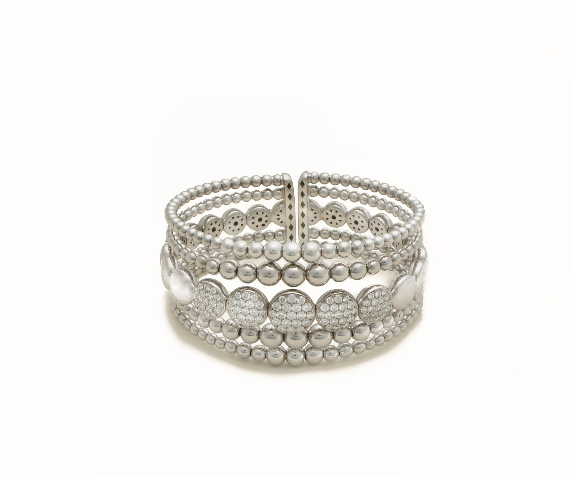 A multi-row diamond cuff in white gold