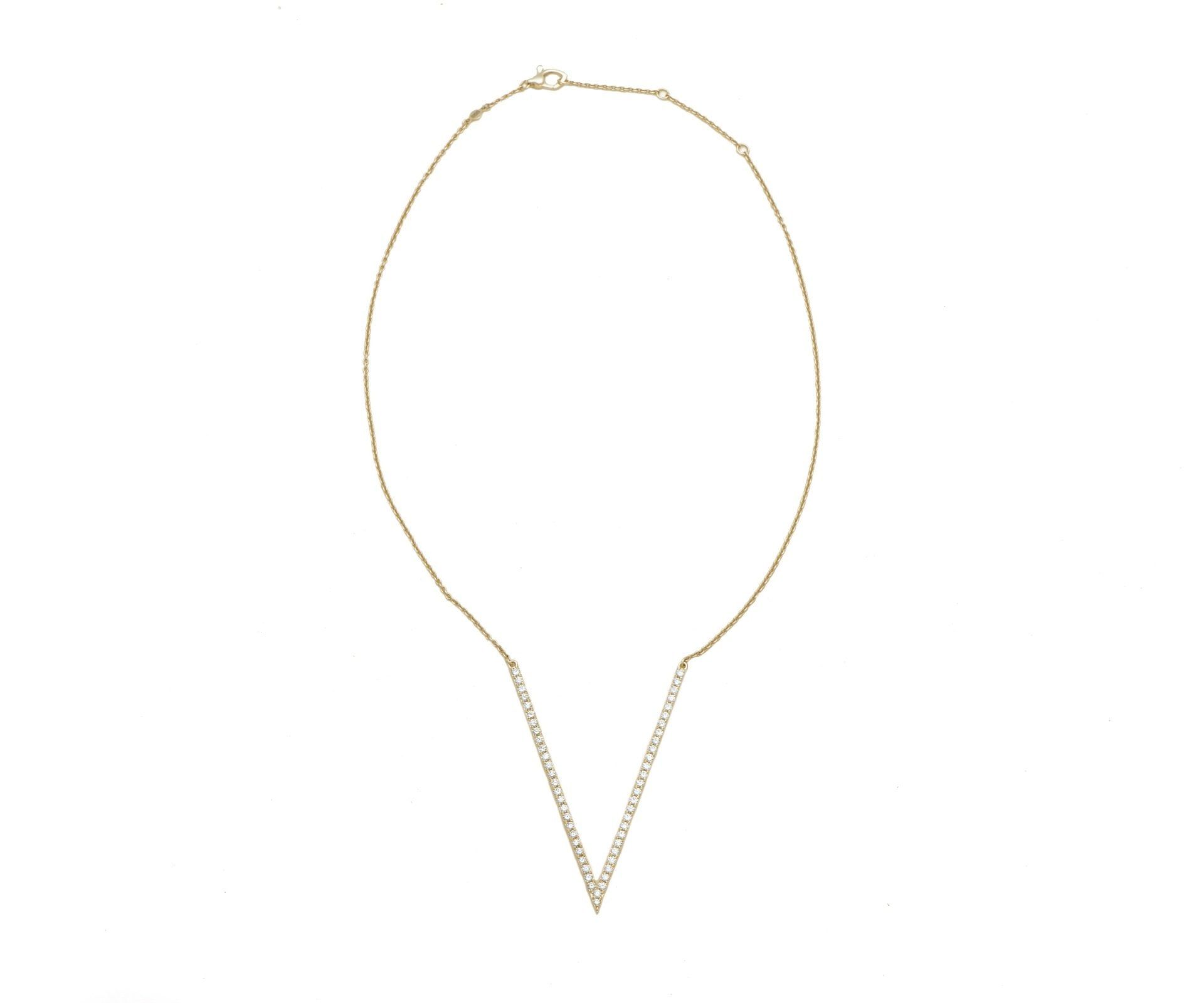 A fine yellow gold chain with a slim V-shaped drop