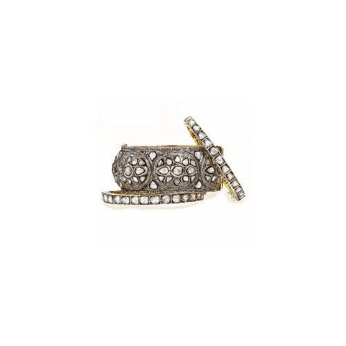 A hinged cuff pavé set with white diamonds