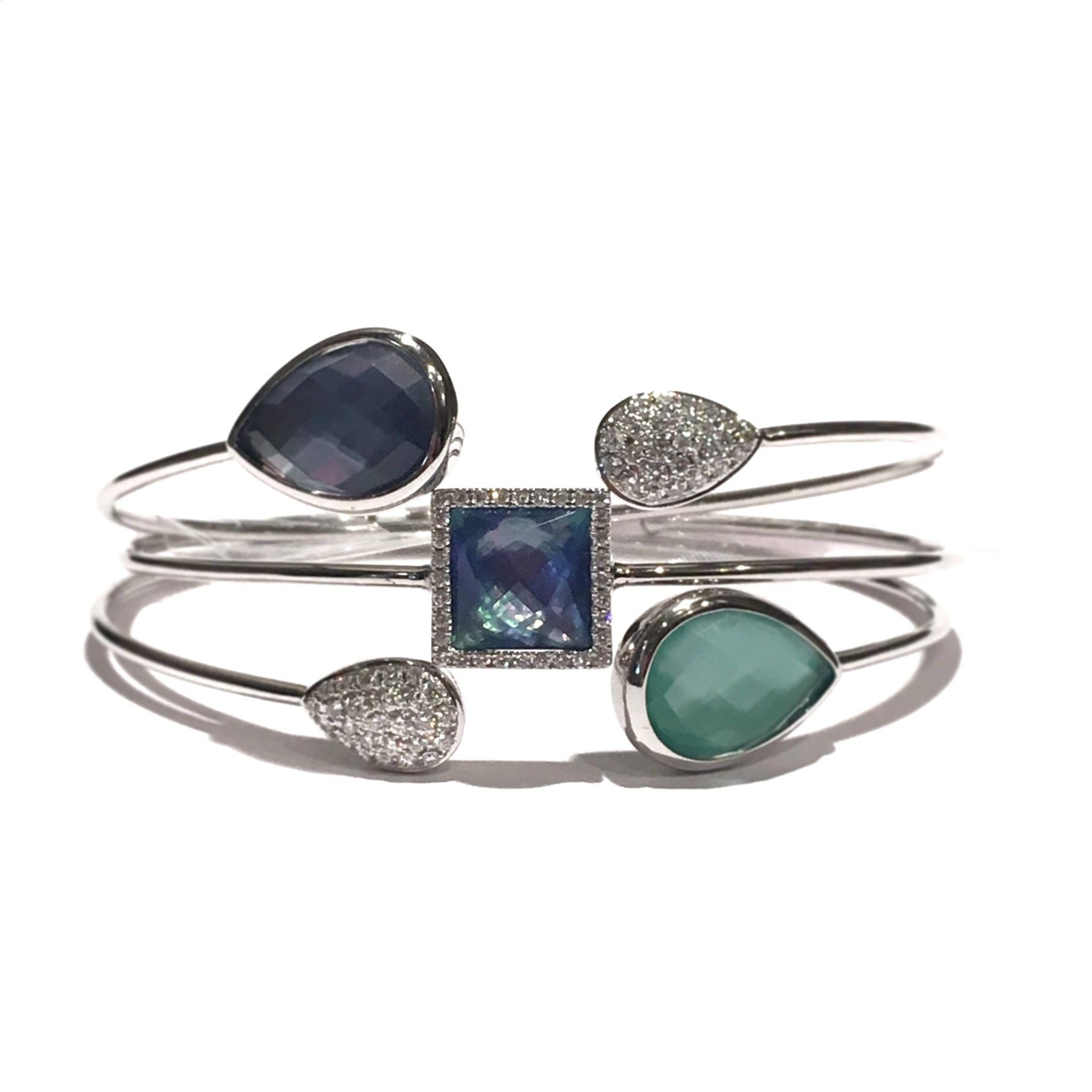 Silver cuffs set with sapphire, aquamarine and green tourmaline