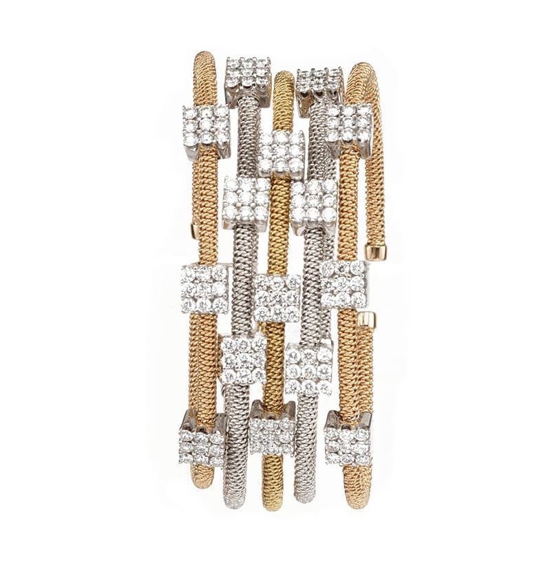 A two-tone gold and diamond link bracelet